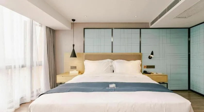 Bed in Echarm Hotel Guiyang North High-speed Railway Station