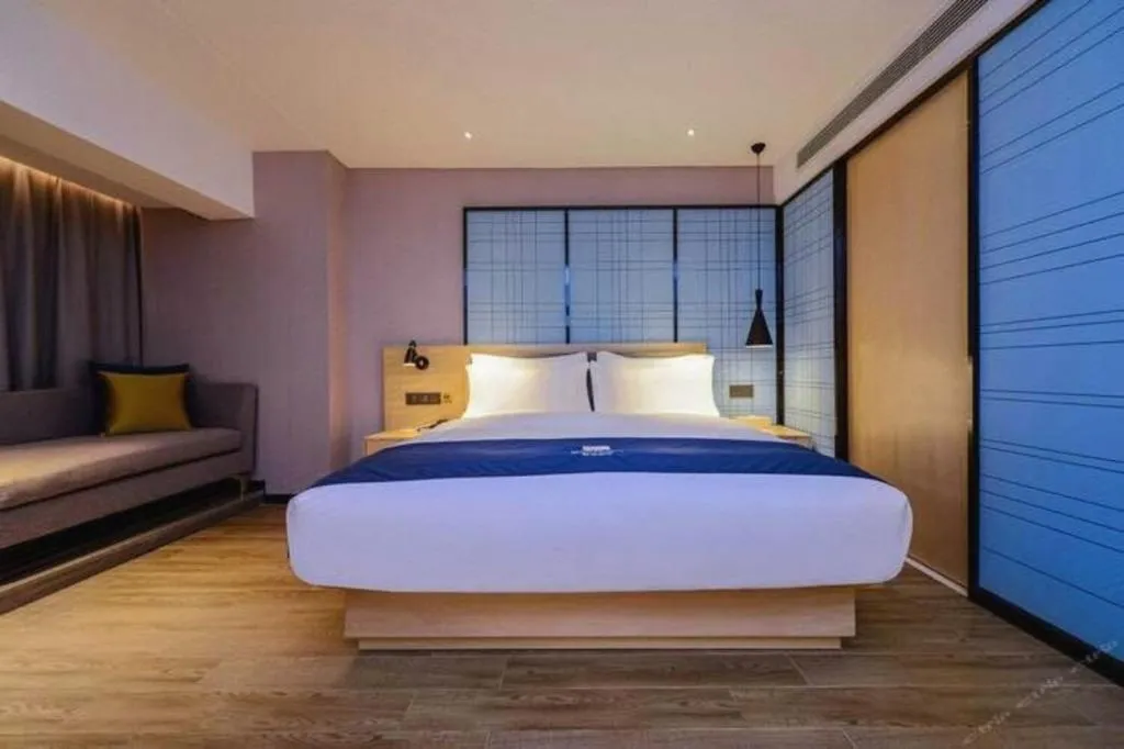 Bed in Echarm Hotel Guiyang North High-speed Railway Station