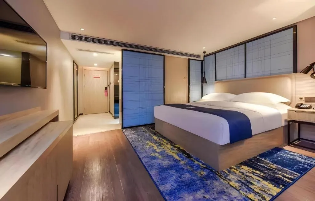 Bed in Echarm Hotel Guiyang North High-speed Railway Station