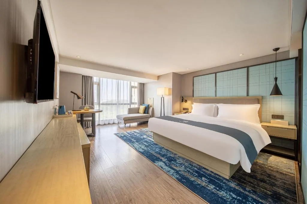 Bed in Echarm Hotel Guiyang North High-speed Railway Station