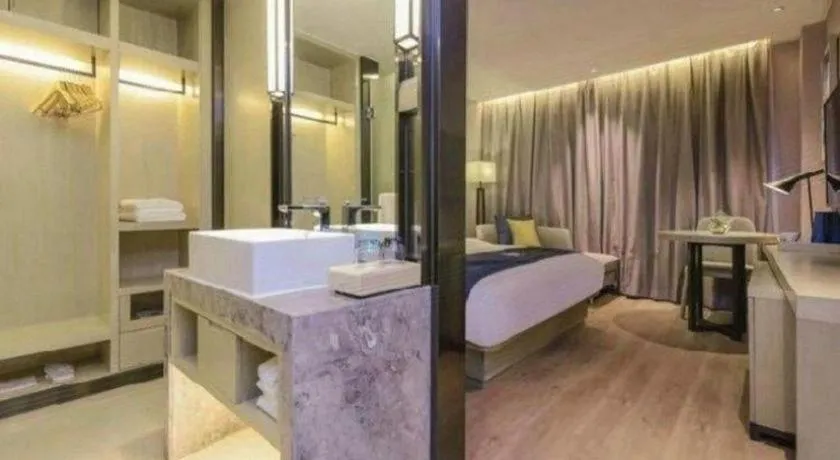 Bed in Echarm Hotel Guiyang North High-speed Railway Station