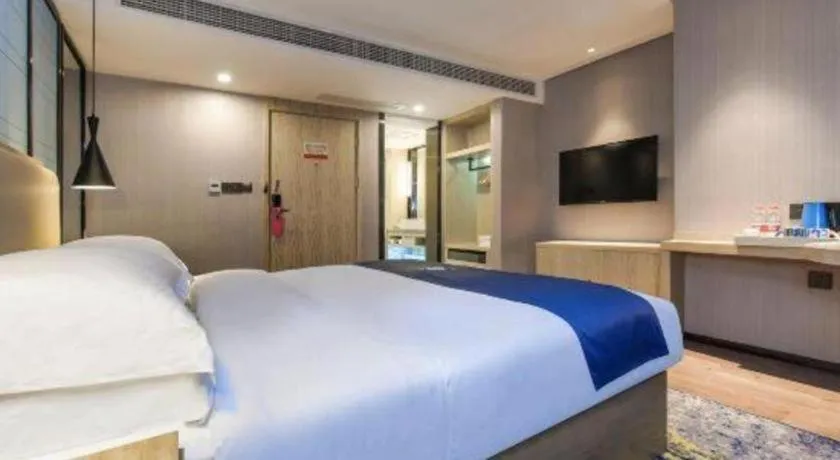 Bed in Echarm Hotel Guiyang North High-speed Railway Station