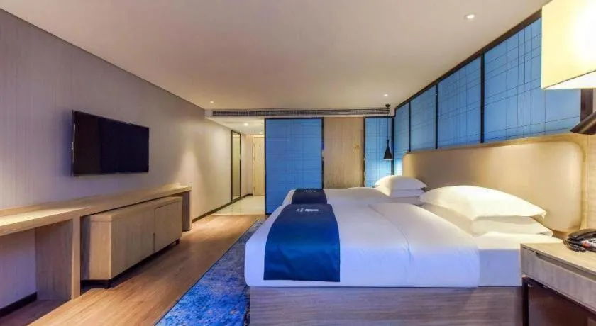 Bed in Echarm Hotel Guiyang North High-speed Railway Station