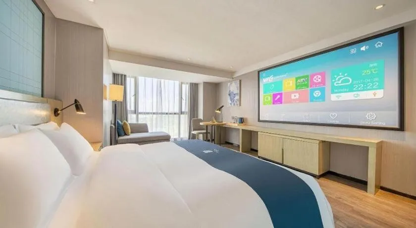 Bed in Echarm Hotel Guiyang North High-speed Railway Station