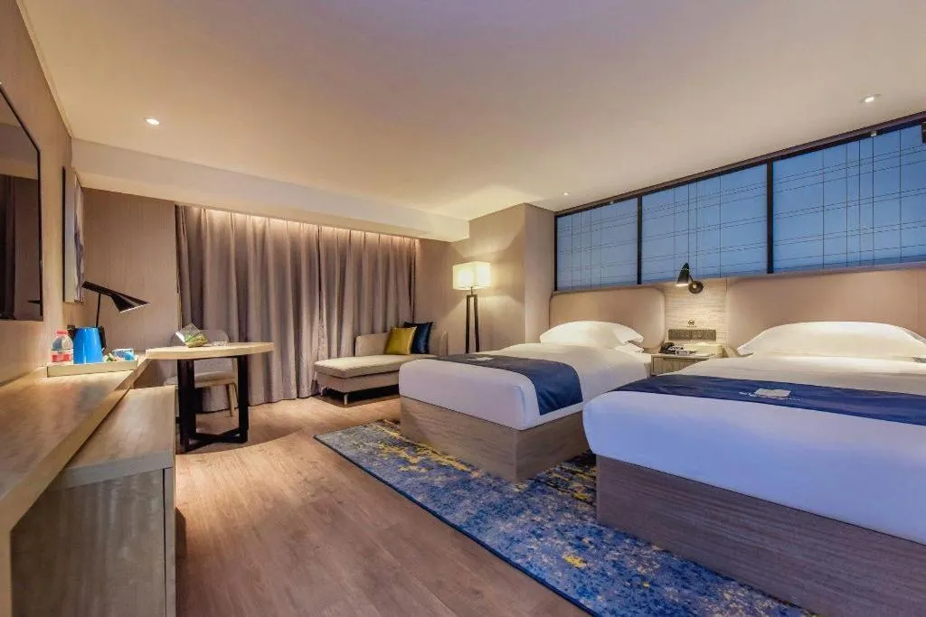 Bed in Echarm Hotel Guiyang North High-speed Railway Station