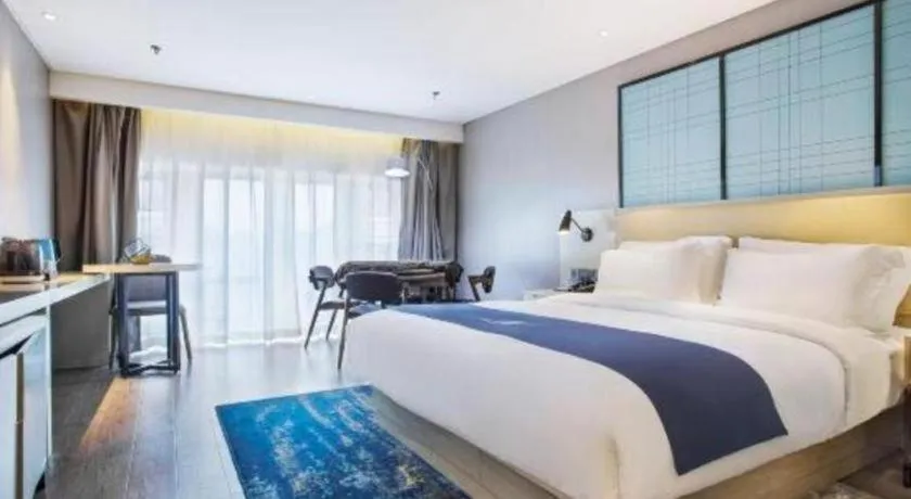 Bed in Echarm Hotel Guiyang North High-speed Railway Station