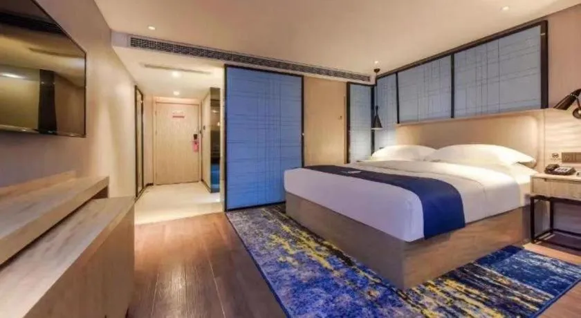 Bed in Echarm Hotel Guiyang North High-speed Railway Station