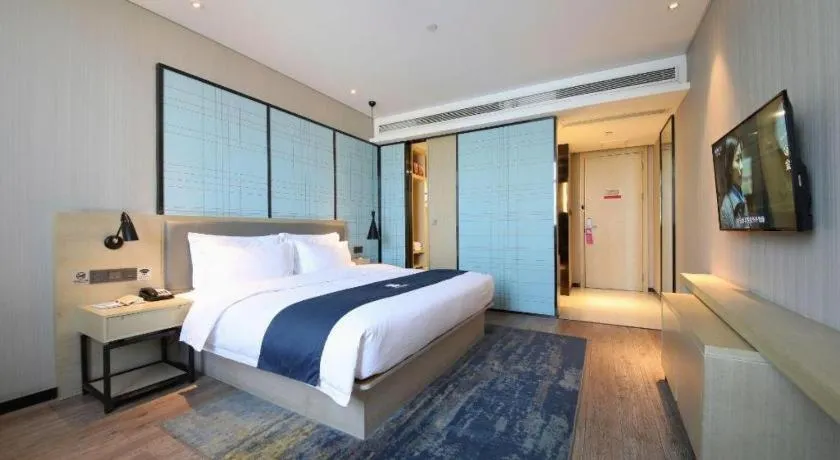 Bed in Echarm Hotel Guiyang North High-speed Railway Station