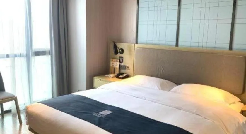 Bed in Echarm Hotel Guiyang North High-speed Railway Station