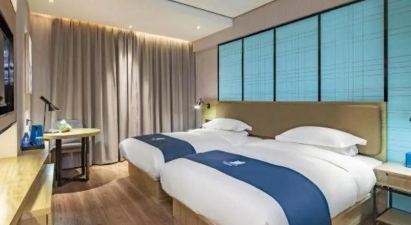 Bed in Echarm Hotel Guilin Railway Station the MixC