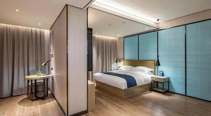 Bed in Echarm Hotel Guilin Railway Station the MixC