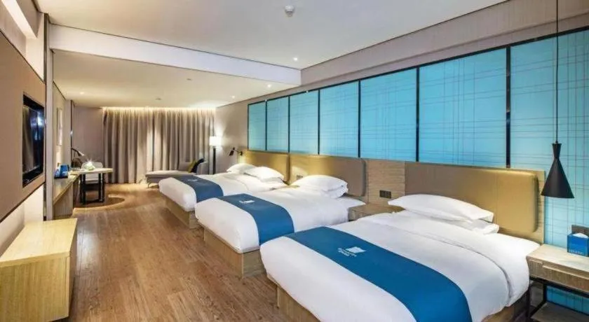 Bed in Echarm Hotel Guilin Railway Station the MixC