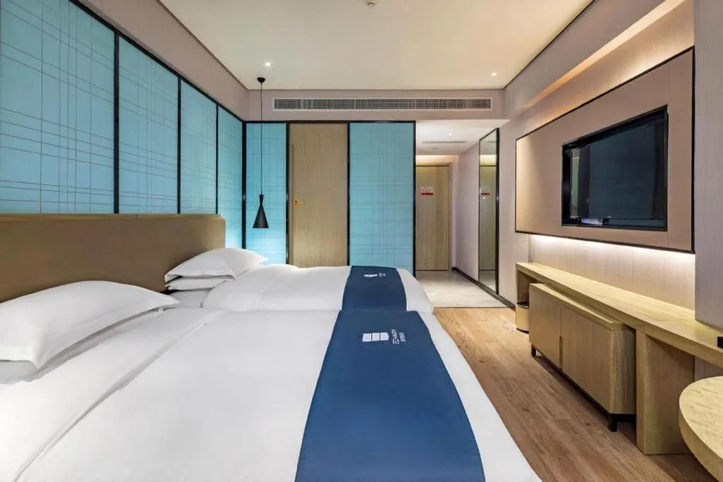 Bed in Echarm Hotel Guilin Railway Station the MixC