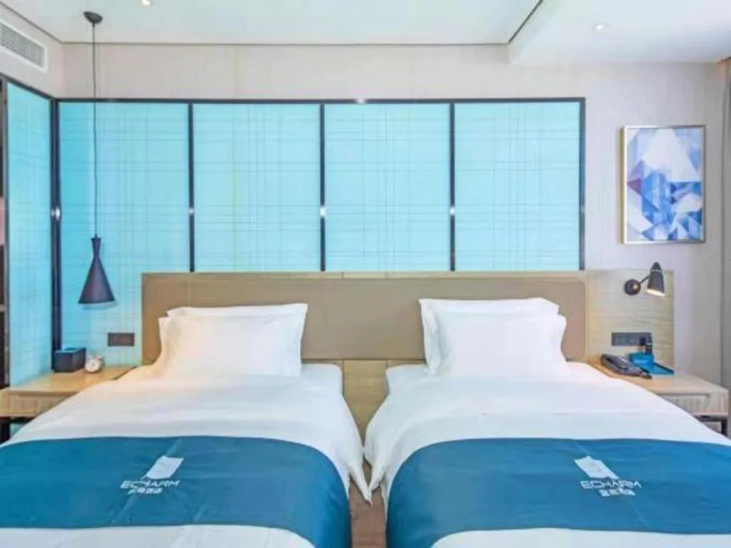 Bed in Echarm Hotel Guilin Railway Station the MixC