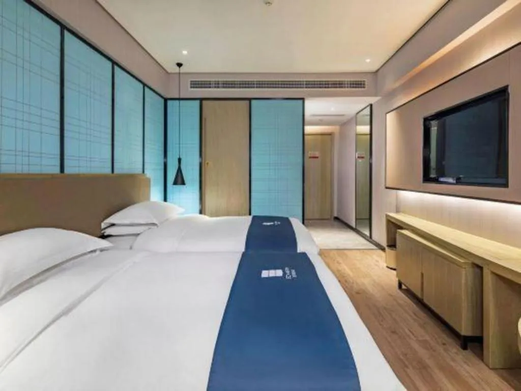 Bed in Echarm Hotel Guilin Railway Station the MixC