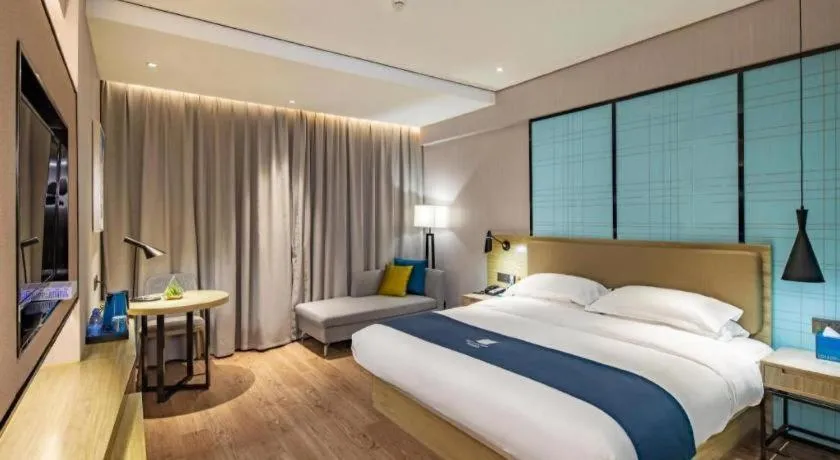 Bed in Echarm Hotel Guilin Railway Station the MixC