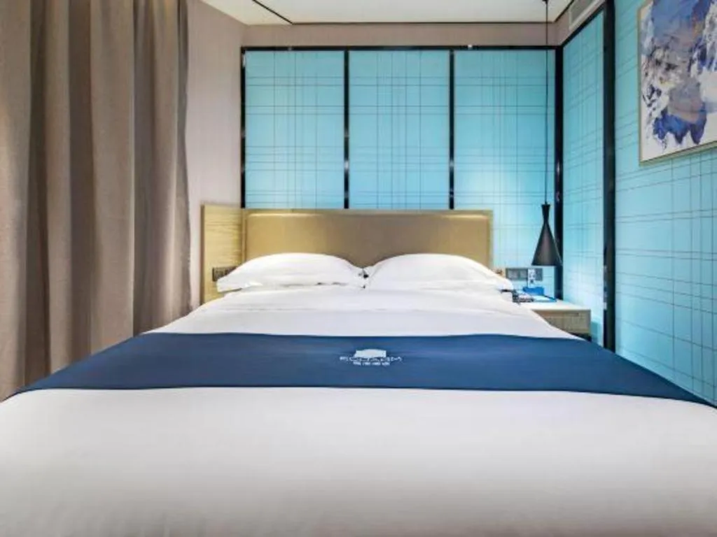 Bed in Echarm Hotel Guilin Railway Station the MixC