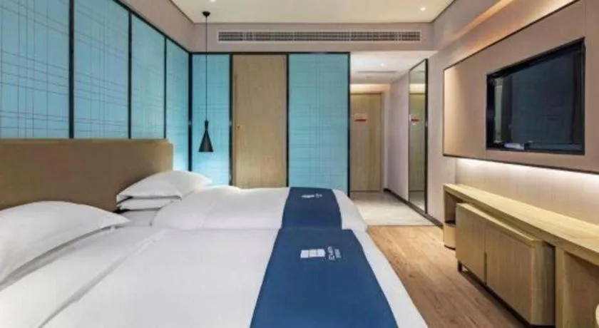 Bed in Echarm Hotel Guilin Railway Station the MixC