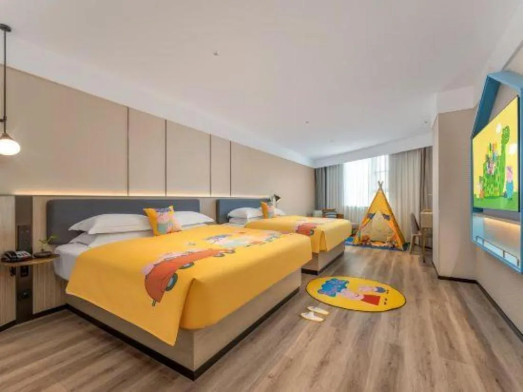 Bed in Echarm Hotel Guilin Railway Station the MixC