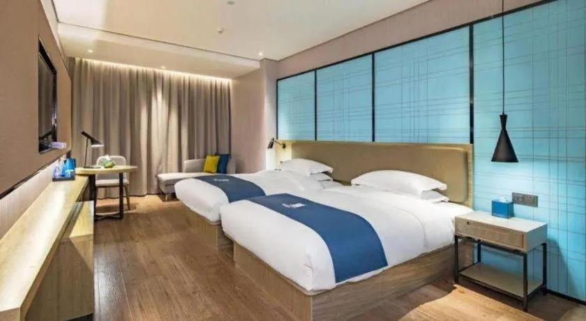 Bed in Echarm Hotel Guilin Railway Station the MixC