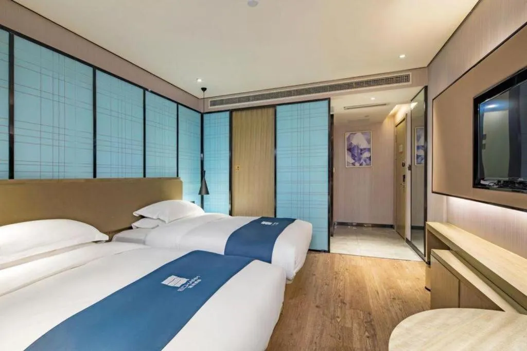 Bed in Echarm Hotel Guilin Railway Station the MixC