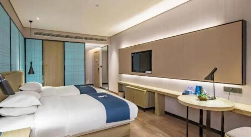 Bed in Echarm Hotel Guilin Railway Station the MixC