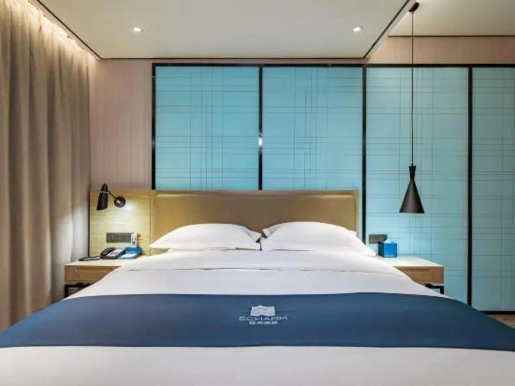 Bed in Echarm Hotel Guilin Railway Station the MixC