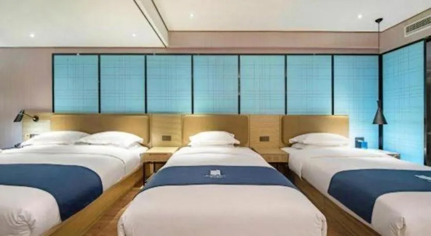 Bed in Echarm Hotel Guilin Railway Station the MixC