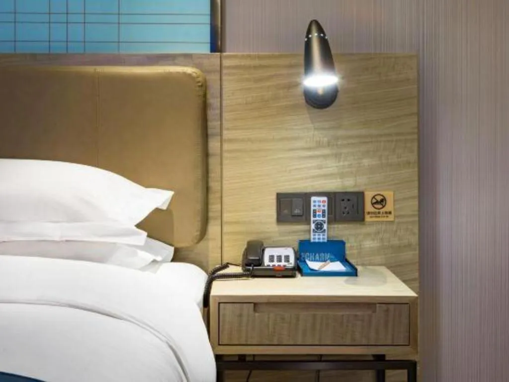 Bed in Echarm Hotel Guilin Railway Station the MixC