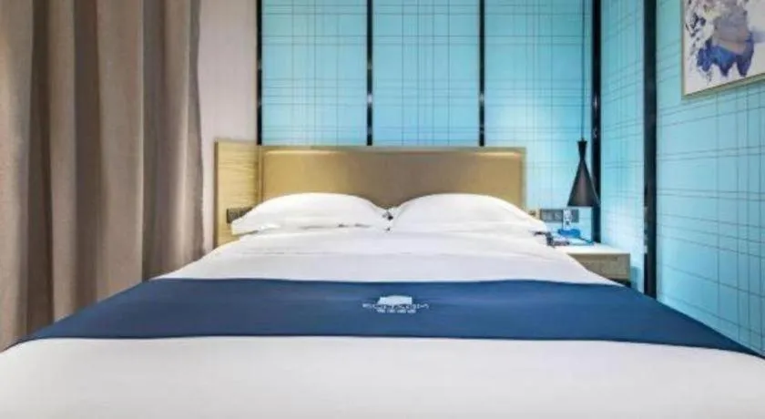 Bed in Echarm Hotel Guilin Railway Station the MixC