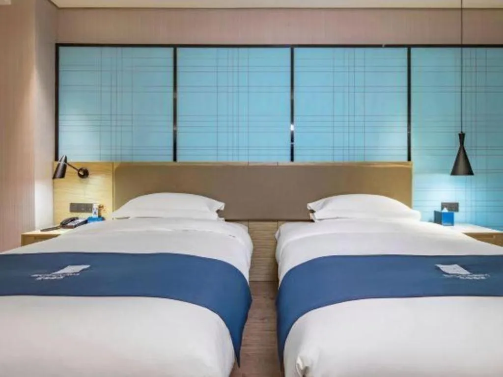 Bed in Echarm Hotel Guilin Railway Station the MixC