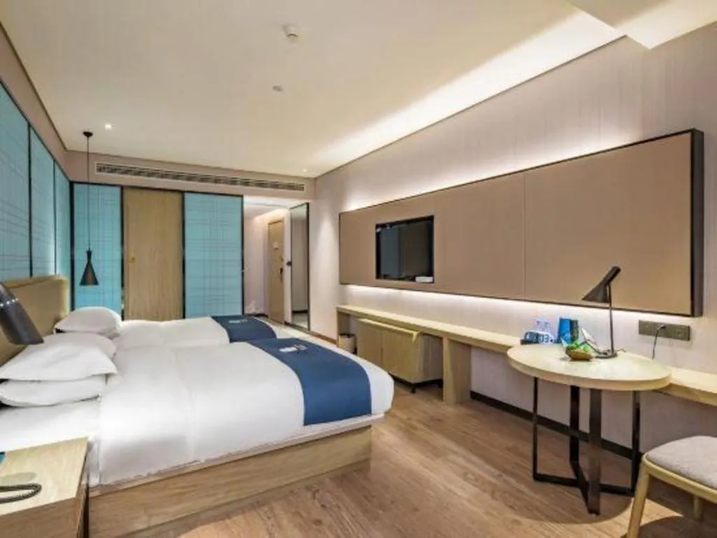 Bed in Echarm Hotel Guilin Railway Station the MixC