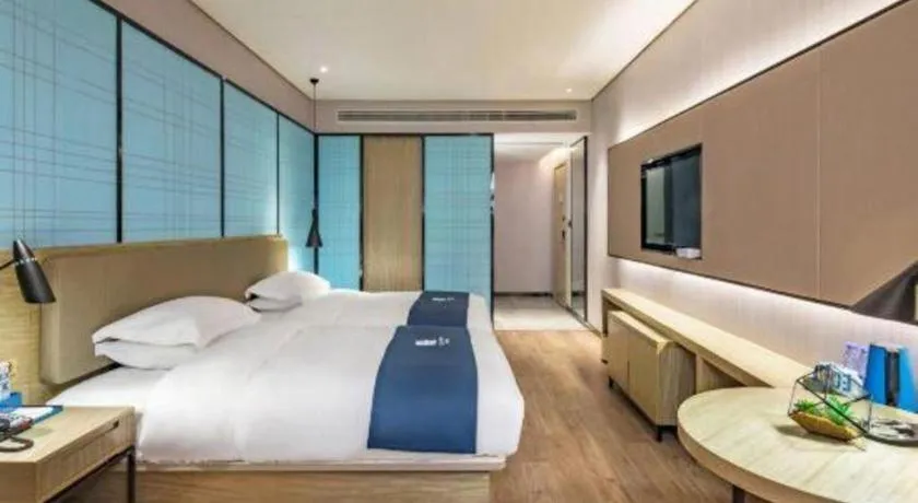 Bed in Echarm Hotel Guilin Railway Station the MixC