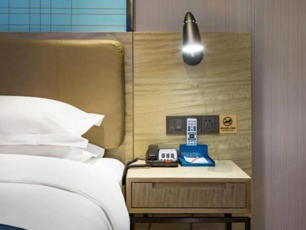 Bed in Echarm Hotel Guilin Railway Station the MixC