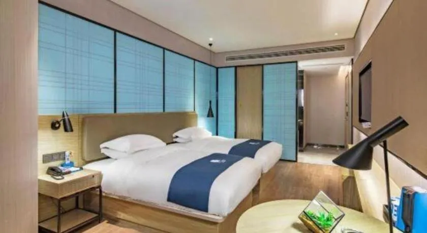 Bed in Echarm Hotel Guilin Railway Station the MixC
