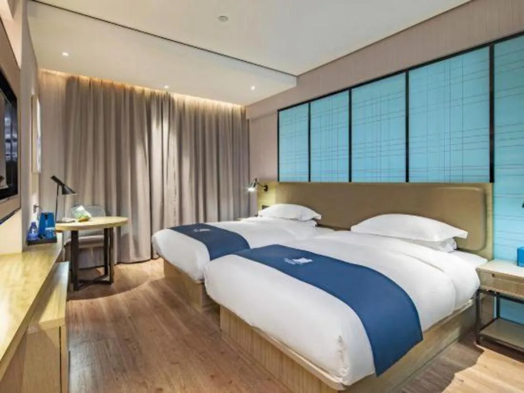 Bed in Echarm Hotel Guilin Railway Station the MixC