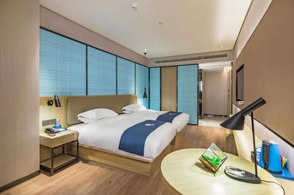 Bed in Echarm Hotel Guilin Railway Station the MixC