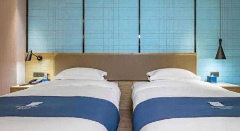 Bed in Echarm Hotel Guilin Railway Station the MixC
