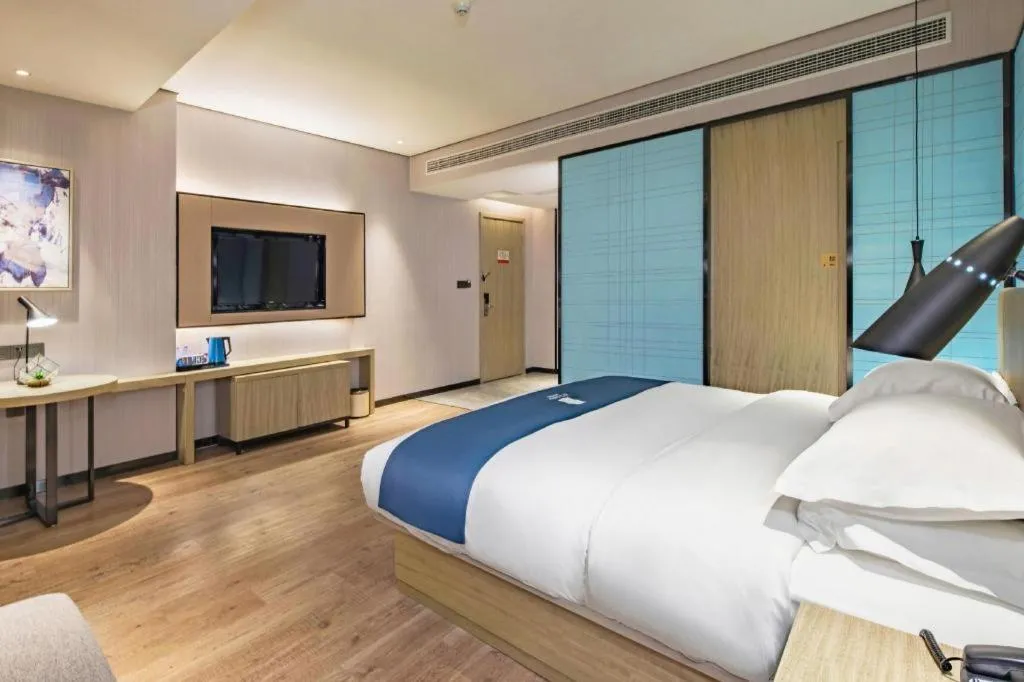 Bed in Echarm Hotel Guilin Railway Station the MixC