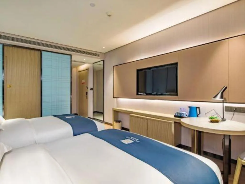 Bed in Echarm Hotel Guilin Railway Station the MixC