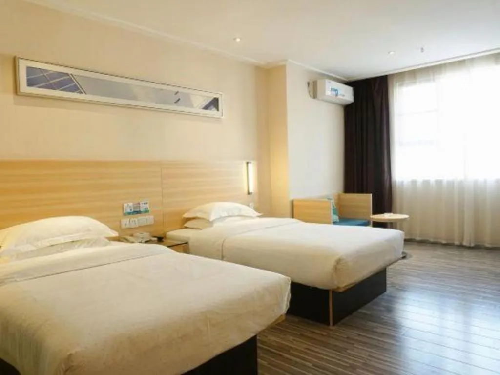 Bed in City Comfort Inn Dongguan Shijie Jiarong Shopping Plaza