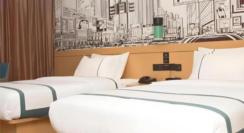 Bed in City Comfort Inn Loudi Sports Center