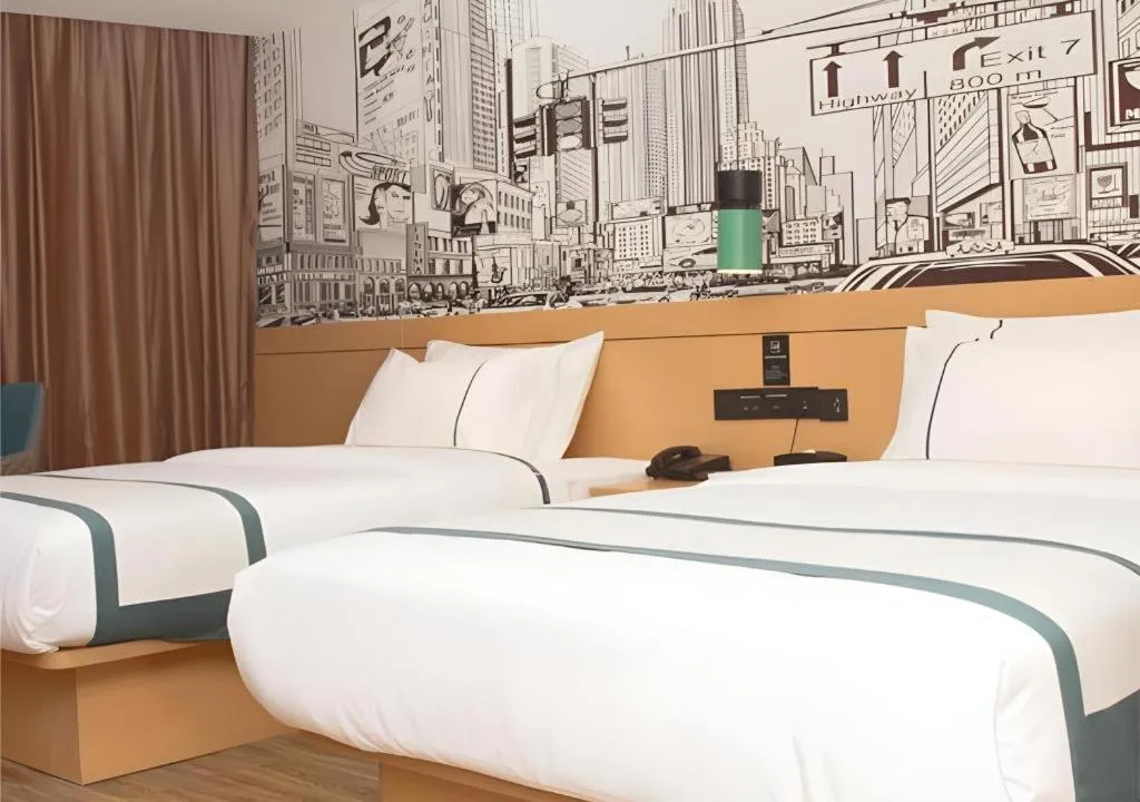 Bed in City Comfort Inn Loudi Sports Center