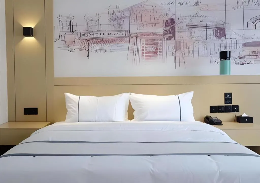 Bed in City Comfort Inn Loudi Sports Center