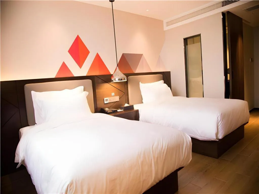 Bed in Borrman Hotel Huanggang Wuxue Yuhu Road