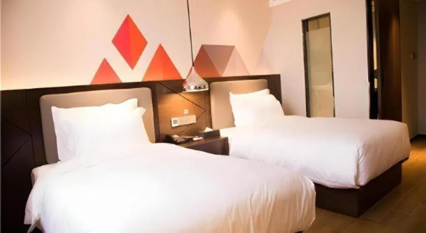 Bed in Borrman Hotel Huanggang Wuxue Yuhu Road