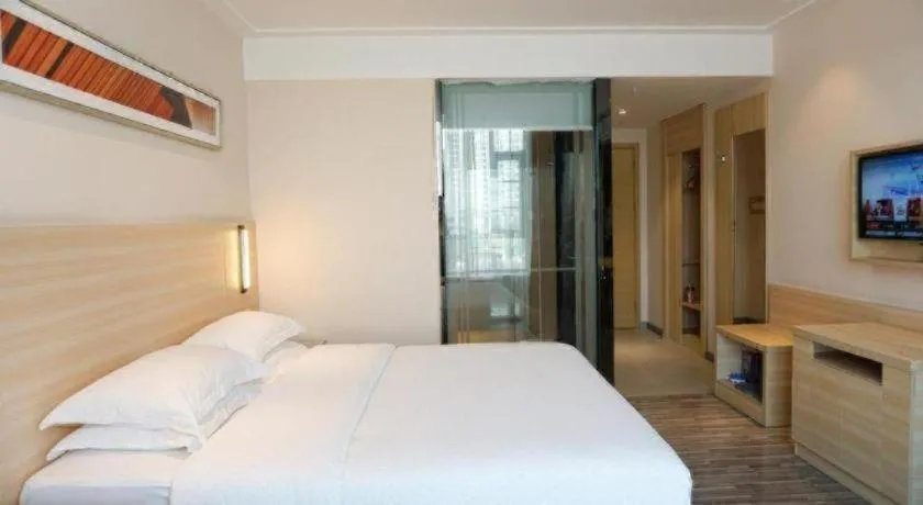 Bed in City Comfort Inn Dongguan Shilong Huixing Commercial Center