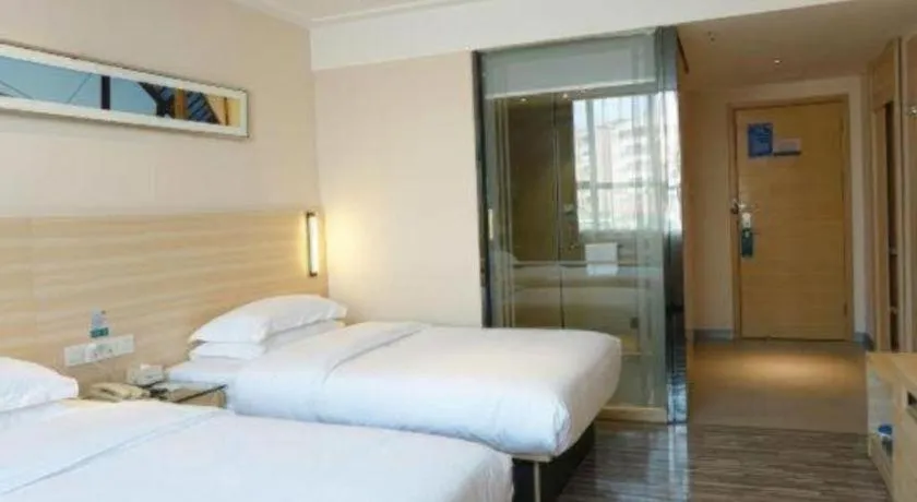 Bed in City Comfort Inn Dongguan Shilong Huixing Commercial Center