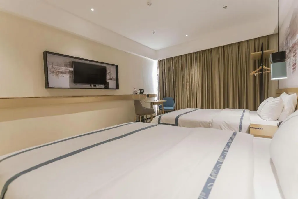 Bed in City Comfort Inn Foshan Shishan Square