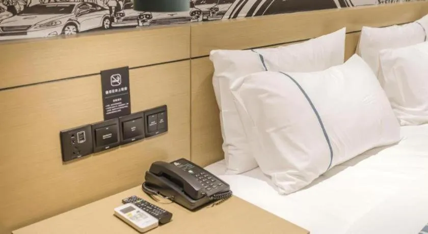 Bed in City Comfort Inn Foshan Shishan Square